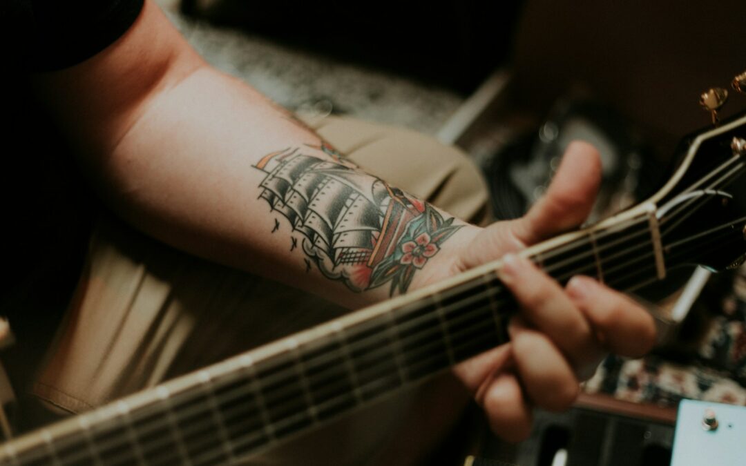sailing ship arm tattoo